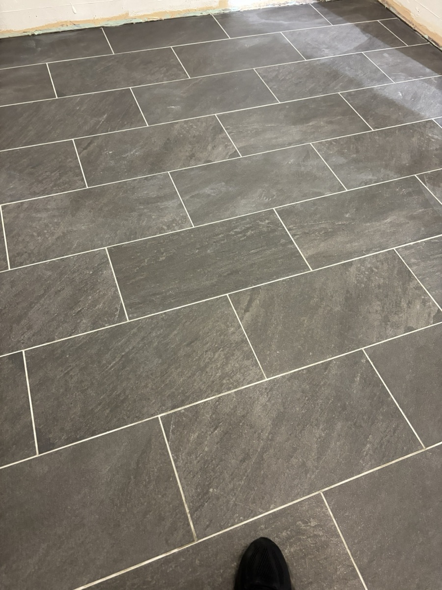 Precision slate tile floor installation — residential remodeling Colorado